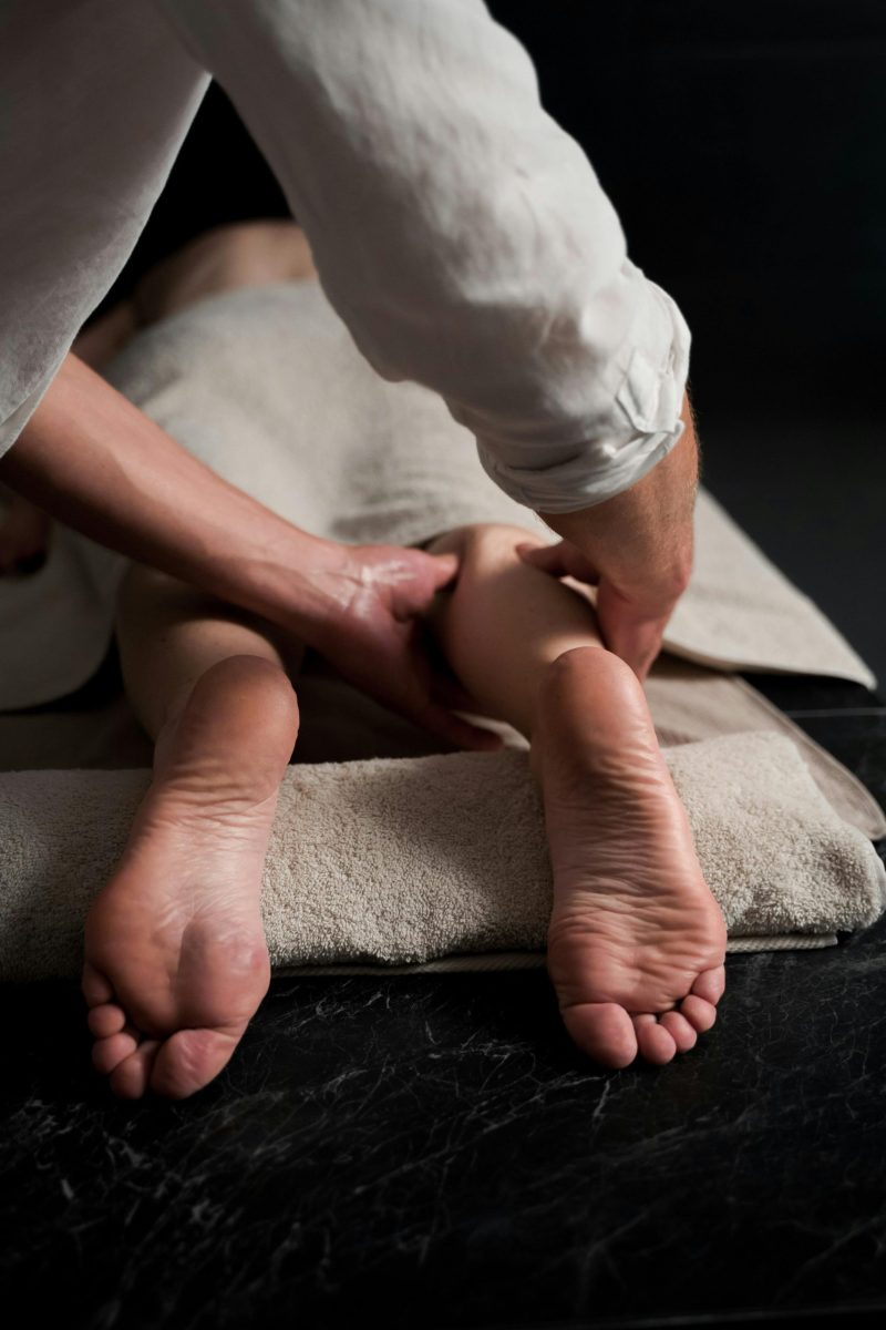 A soothing foot massage in a spa setting, focusing on relaxation and self-care.
